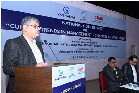 Dr.ParagKalkar,Dean Faculty of Commerce & Management, SPPU& Executive Member AIMS addressing the  audience.
