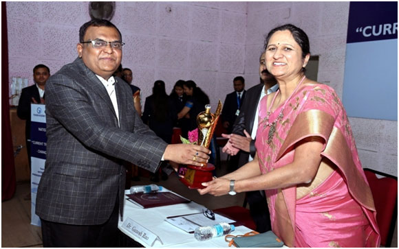 Felicitation of Chief Guest Dr ApoorvaPalkar,Director IIL,SPPU and Past President AIMS